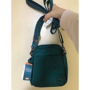 NWOT. Lug FlapperTeal Crossbody Travel Bag